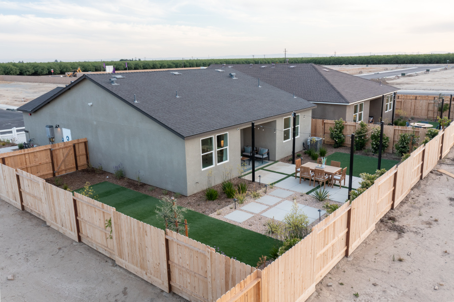 A house with a fence around it.