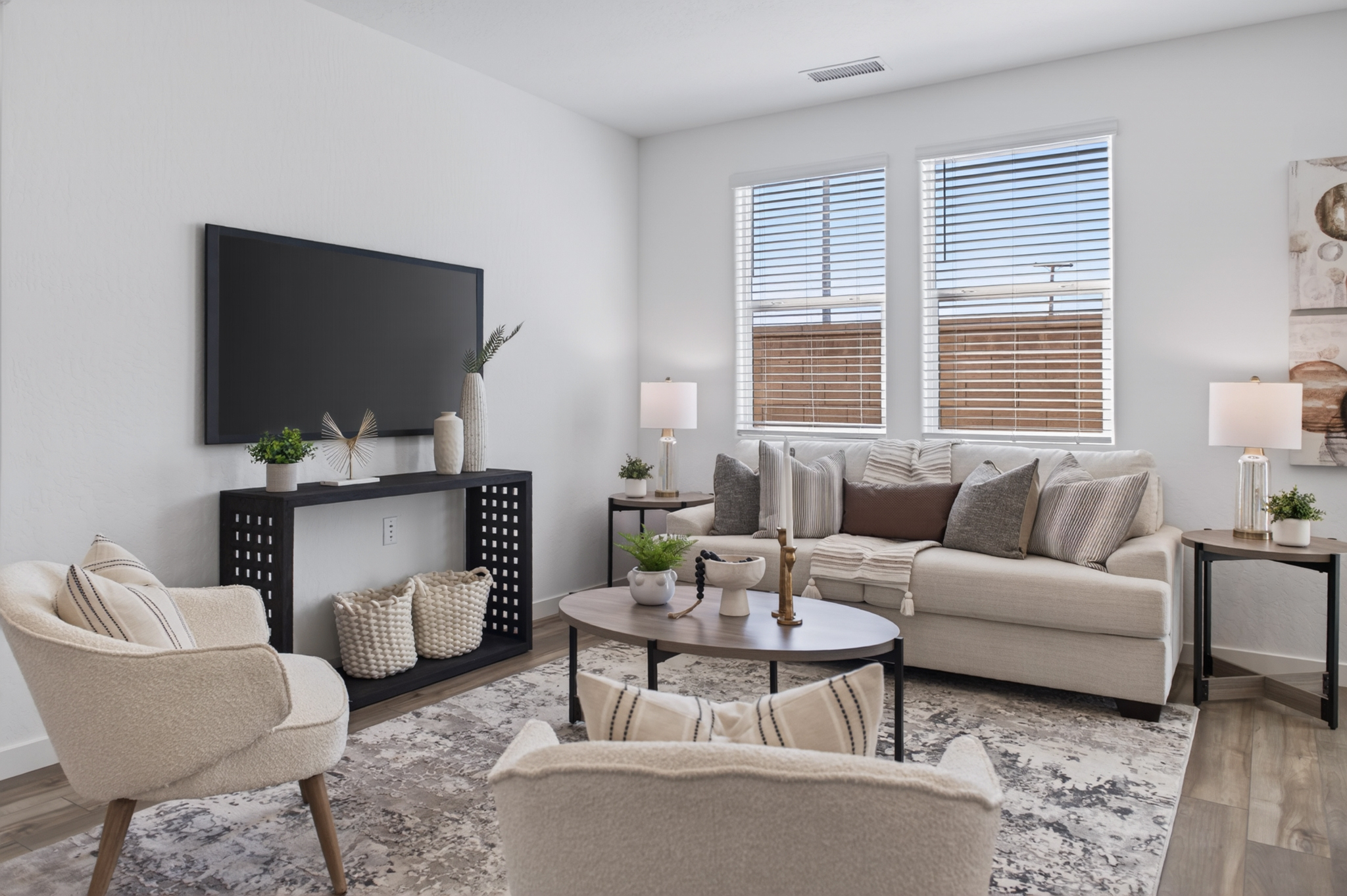 A living room with a tv and couches.