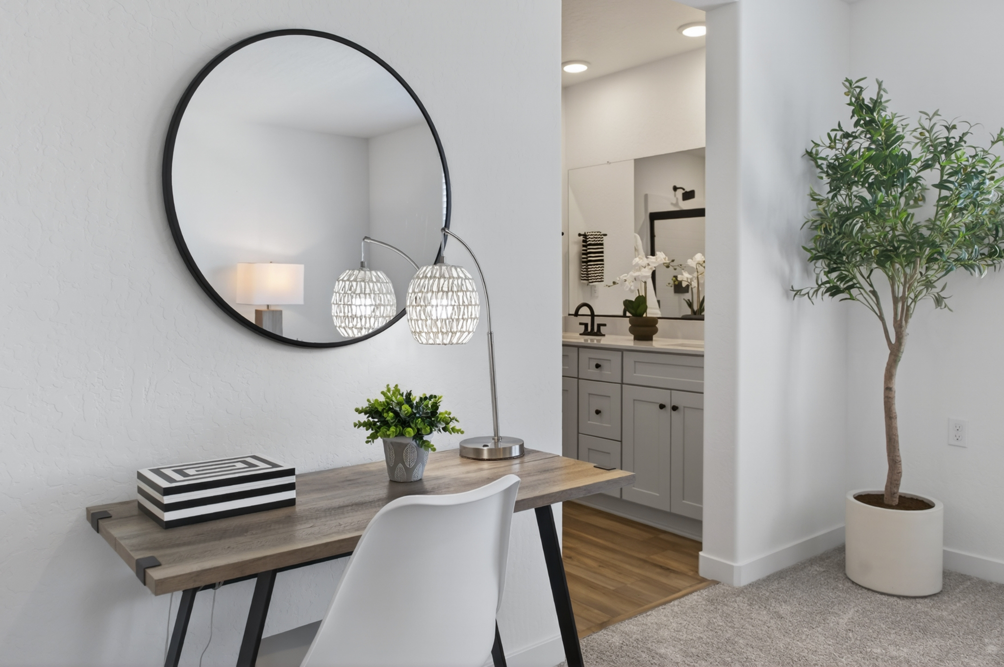 A room with a table and chairs.