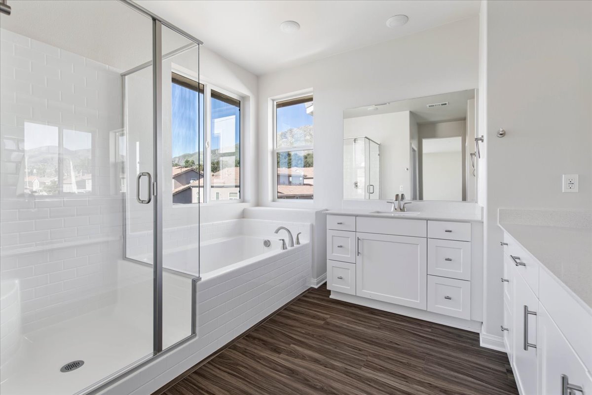 A bathroom with a glass shower.