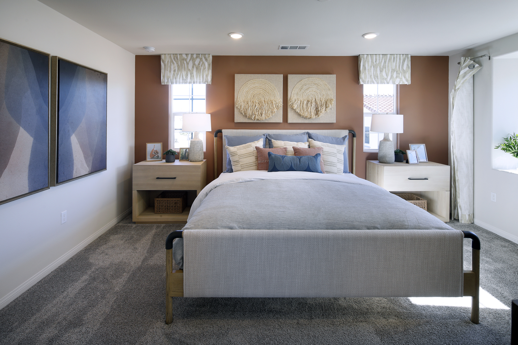 A bedroom with a large bed.