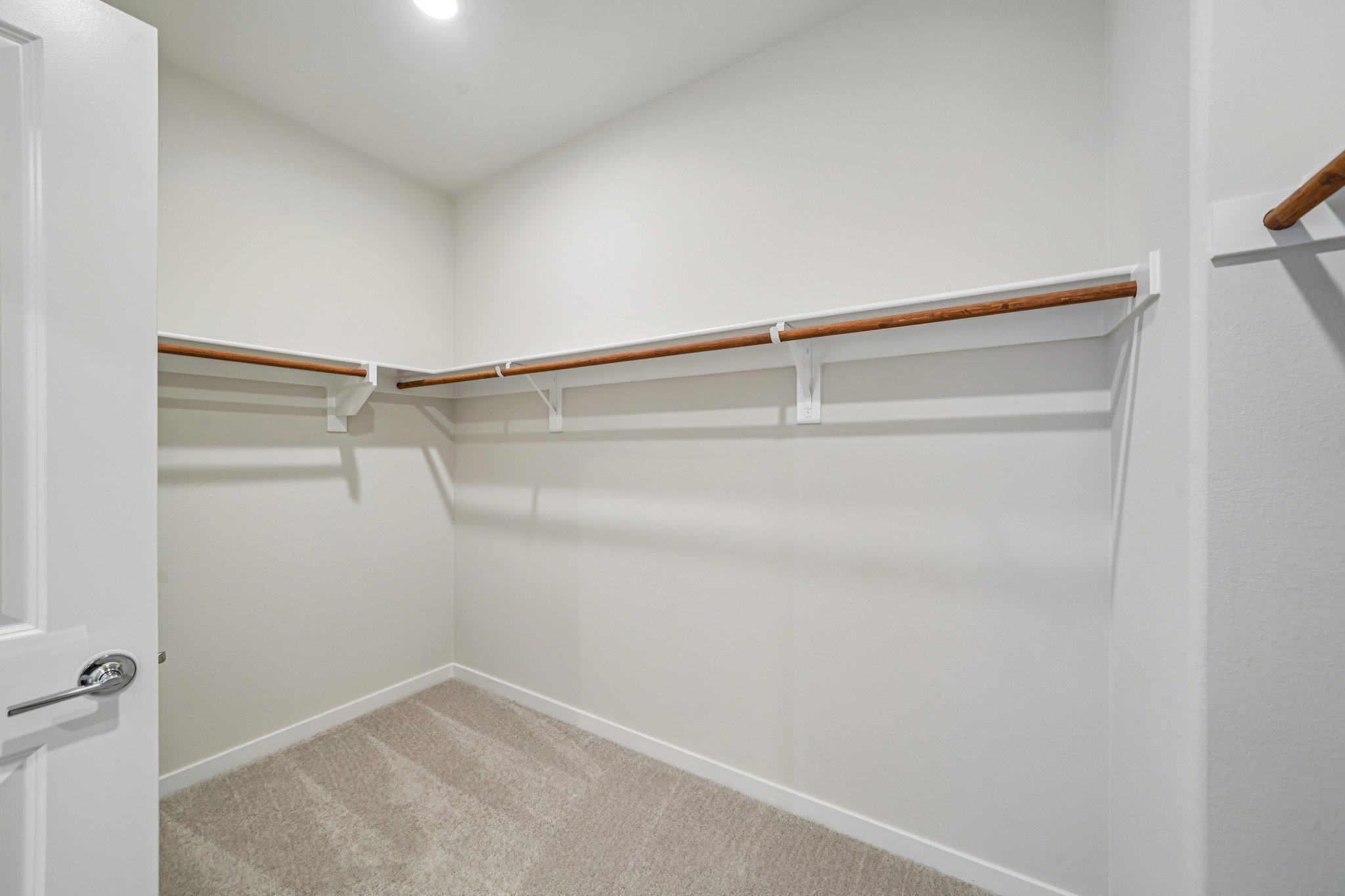 A white room with a white wall.