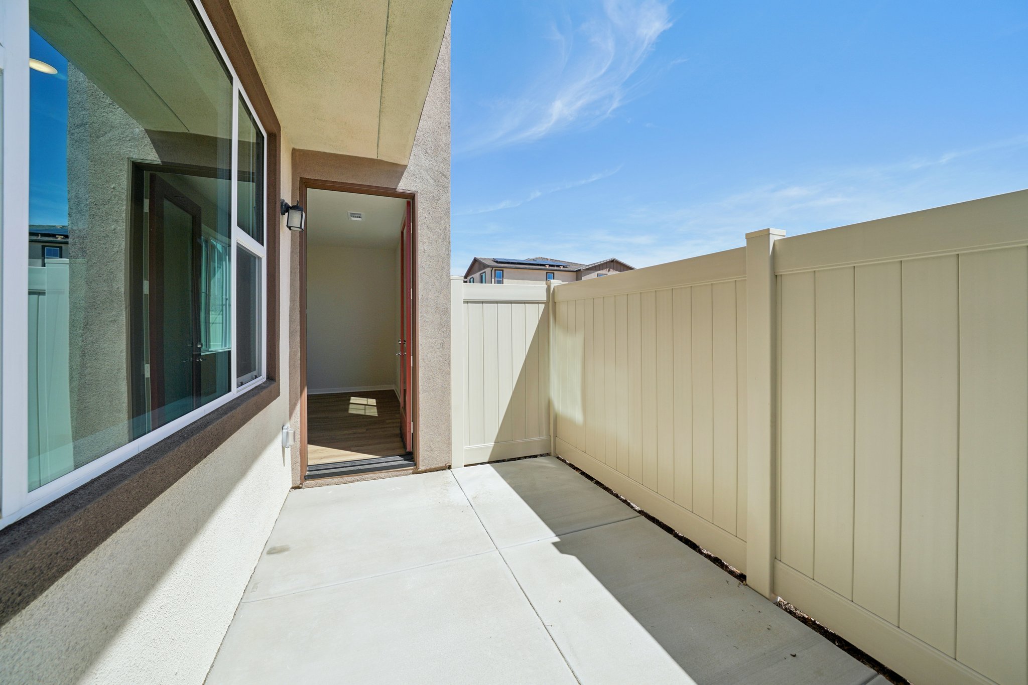 A long hallway with white walls.