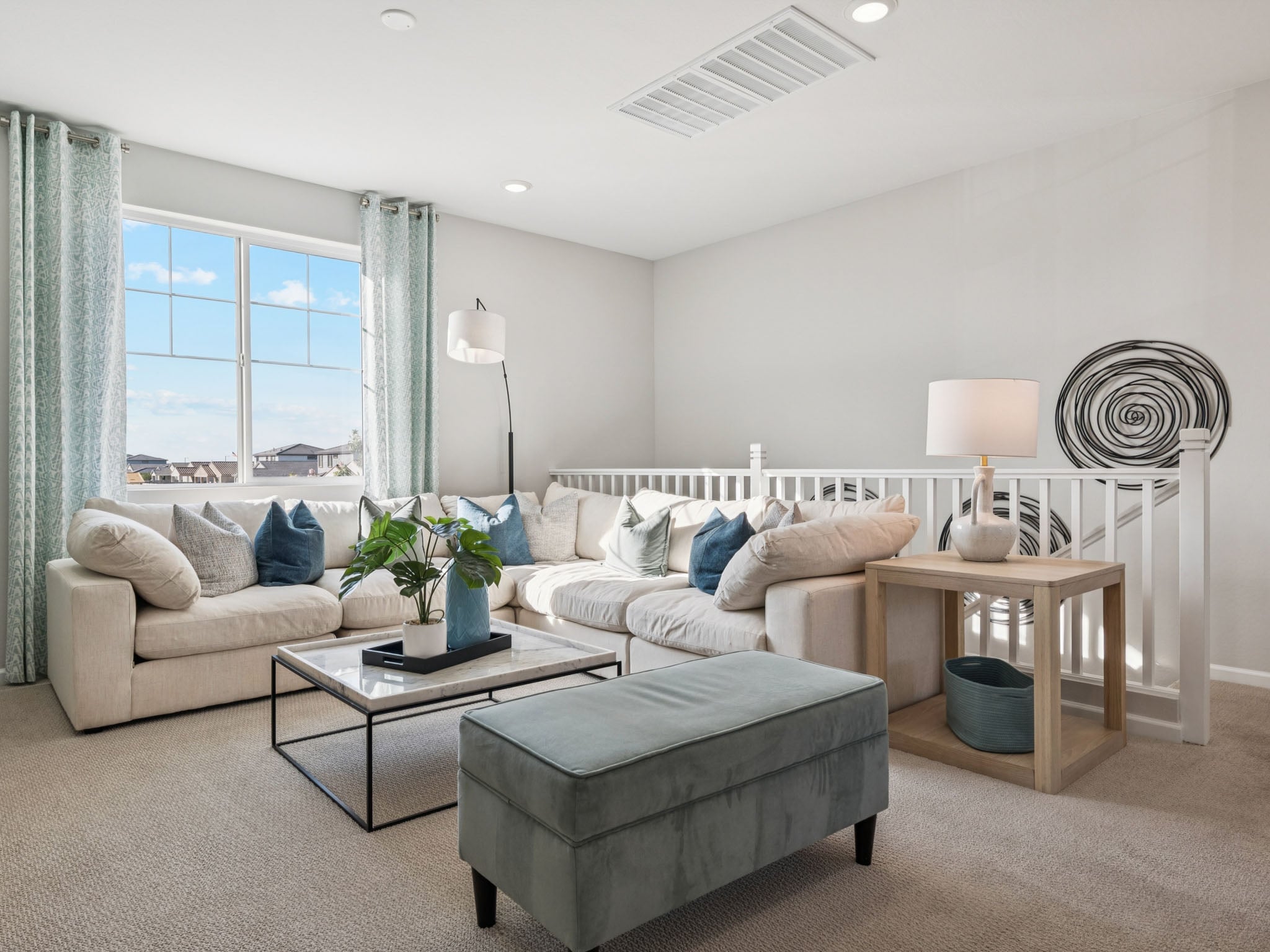 A living room with a couch and a coffee table.