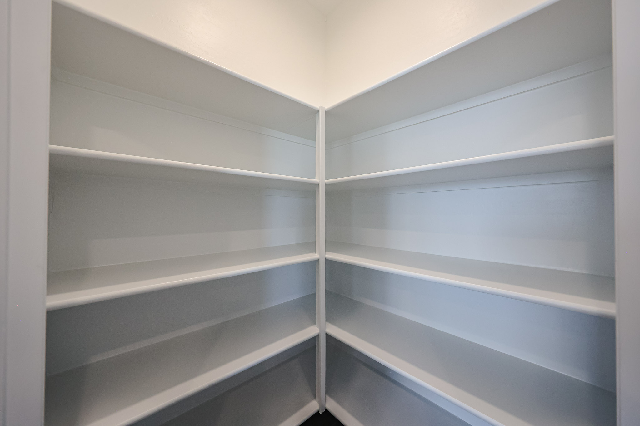 A white shelf with white shelves.