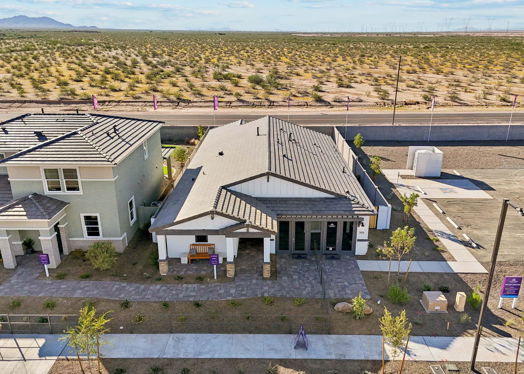 A group of houses in a field.