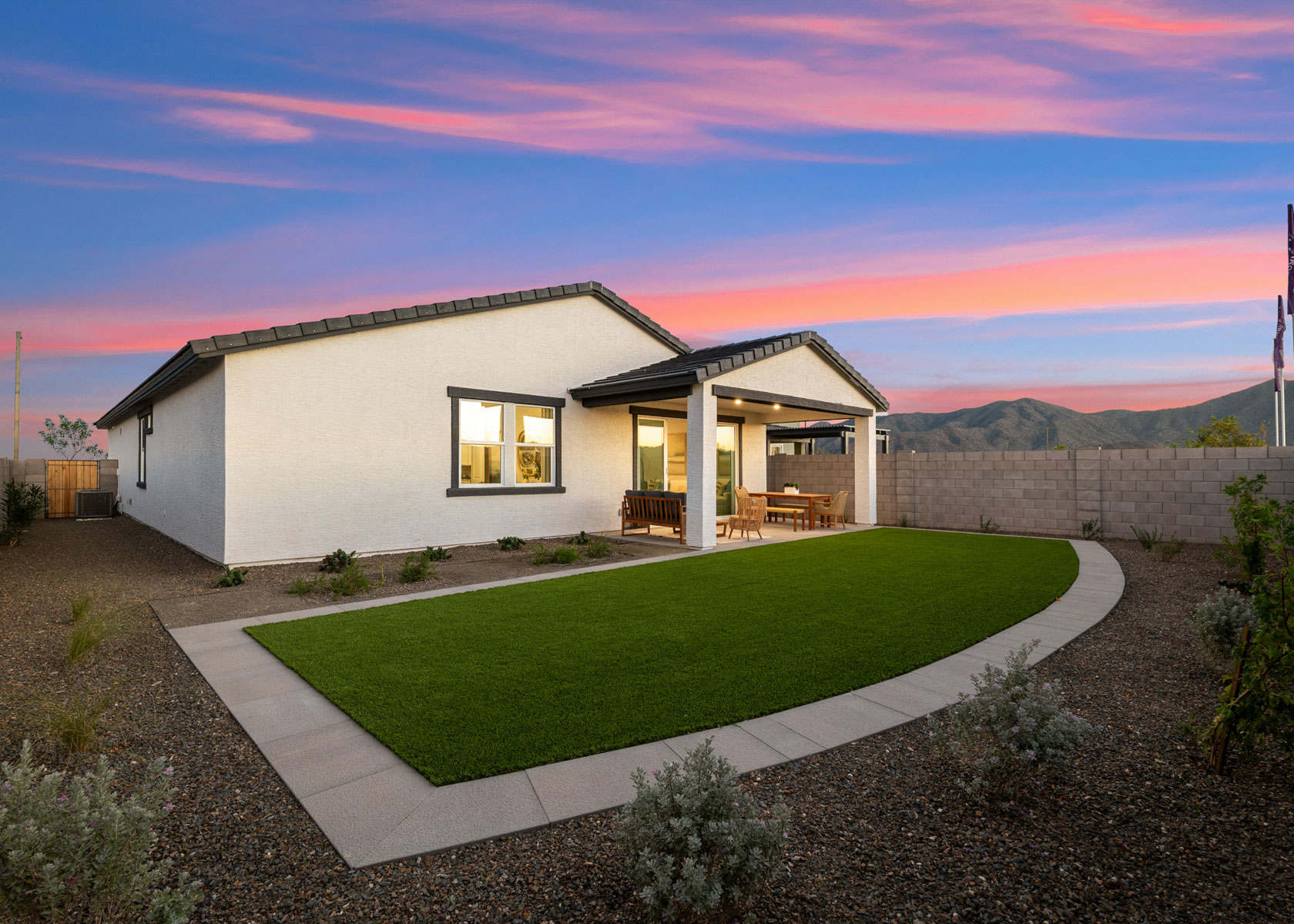 A house with a large front yard.