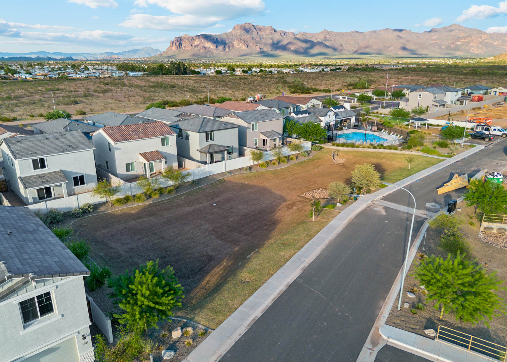 A neighborhood with a road and houses.