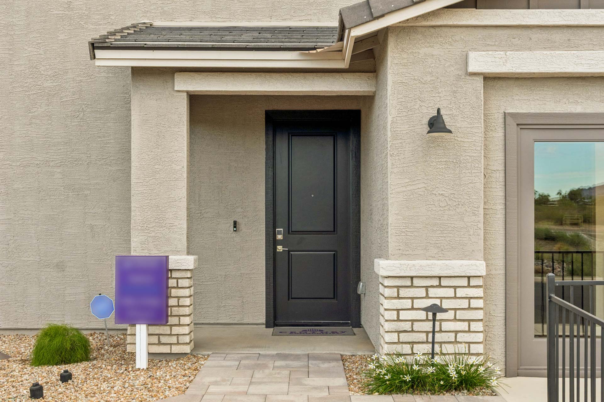 A building with a black door.