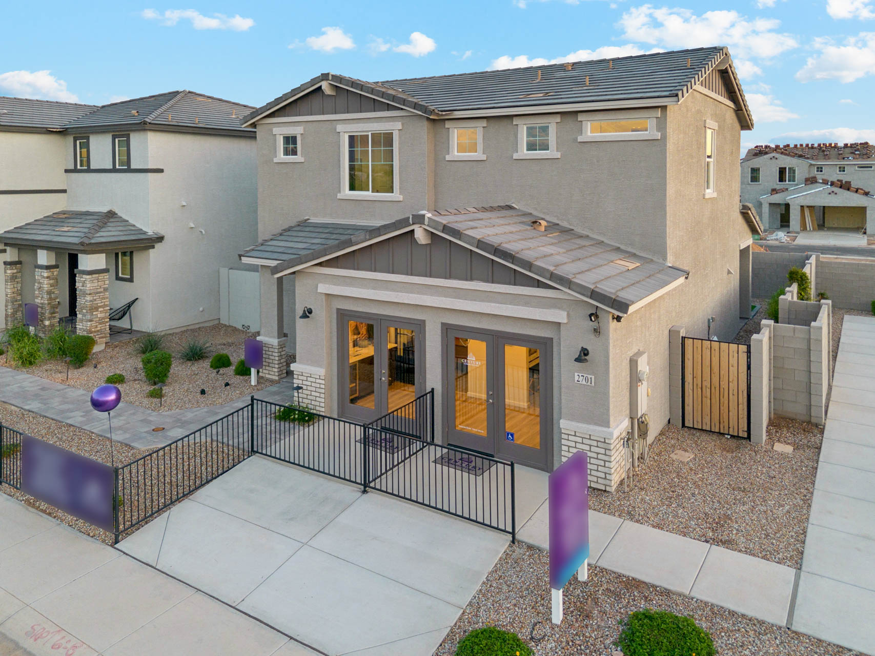 A house with a fence around it.