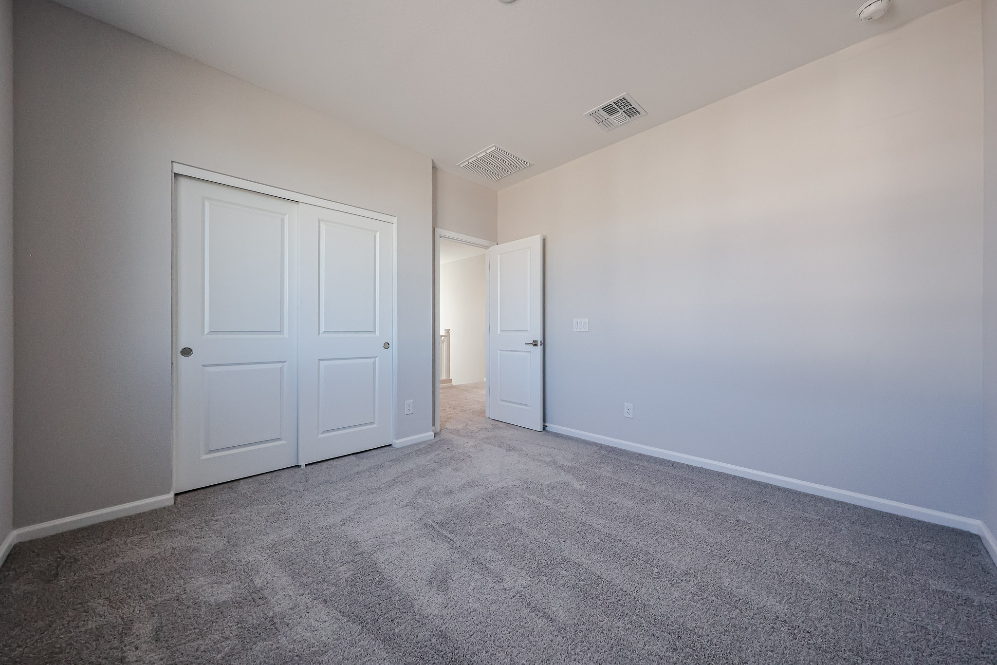A room with white doors.
