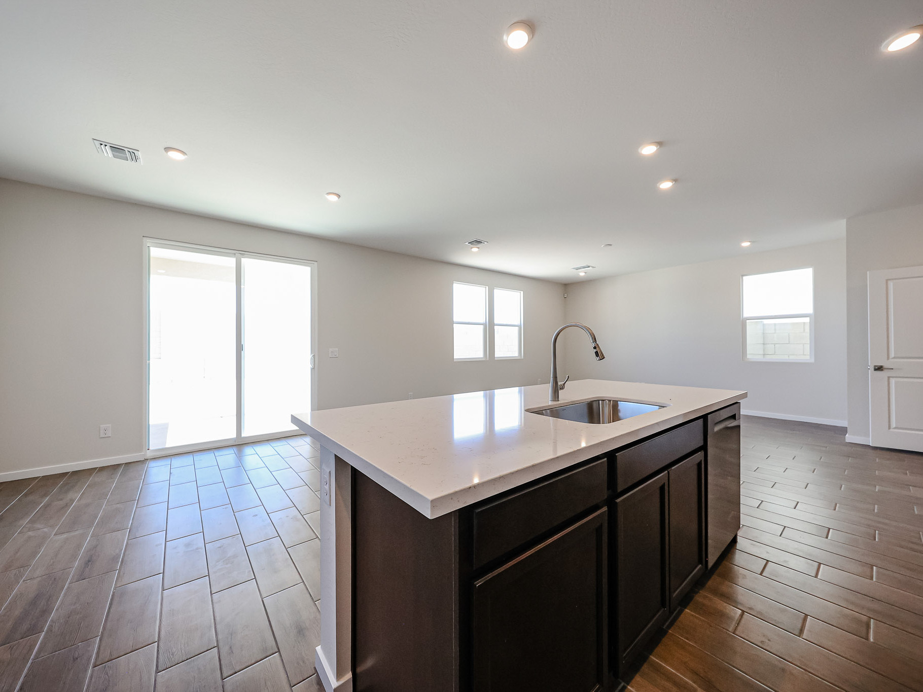 A kitchen with a large island.