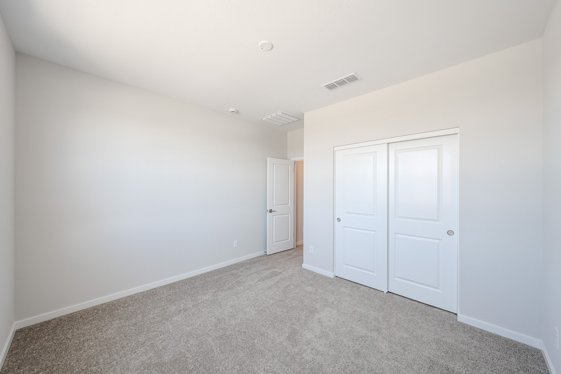 A room with white doors.