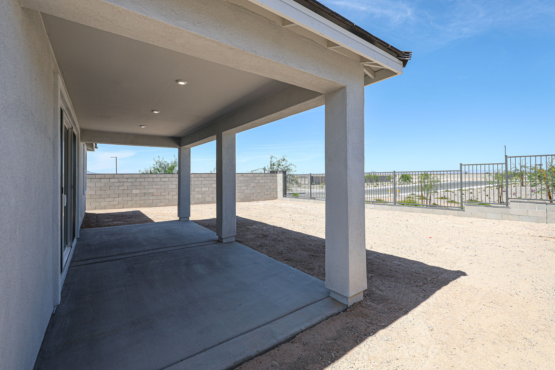 A concrete structure with a fence around it.
