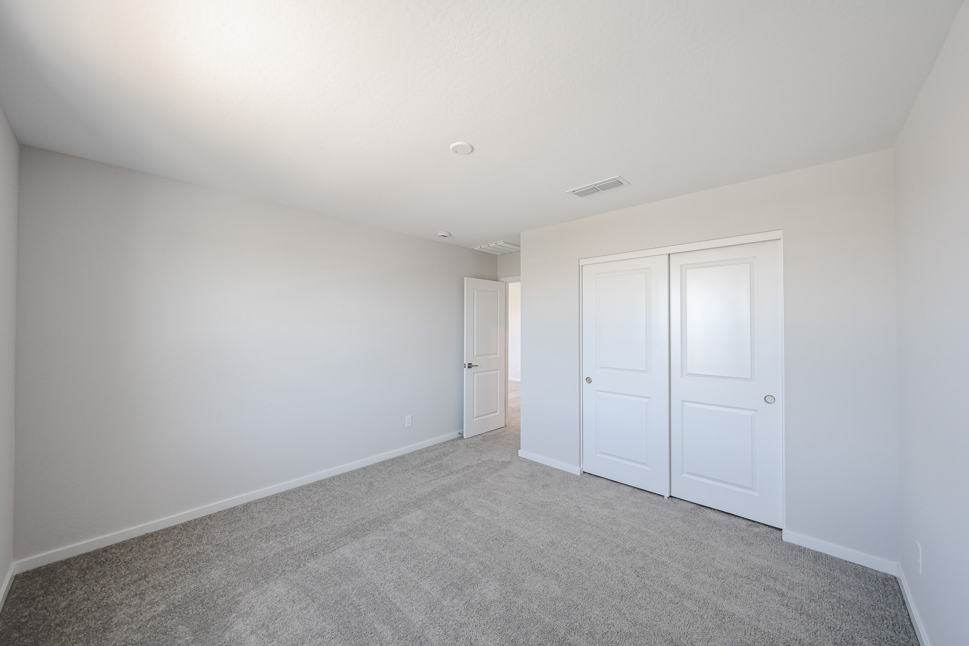A room with white doors.
