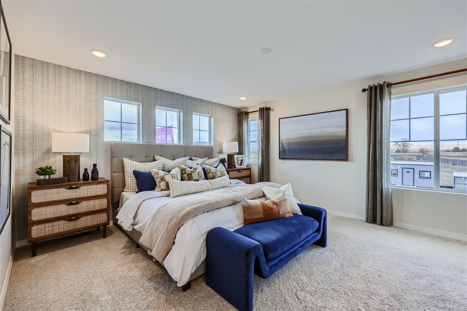 A large bedroom with a large bed.