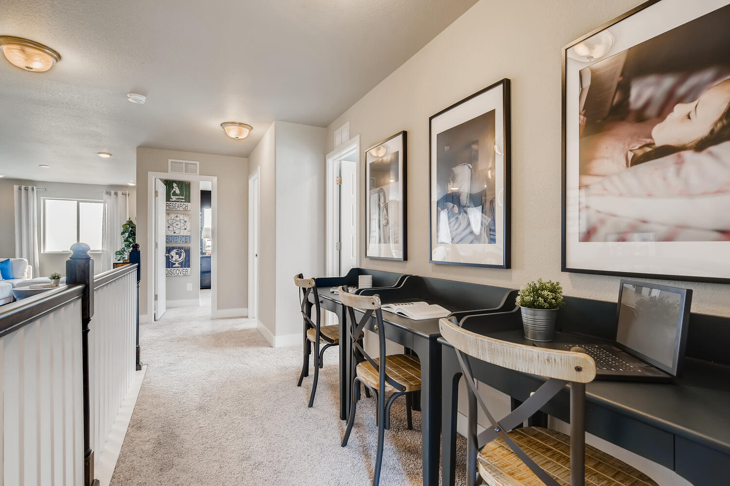 A room with a table and chairs.