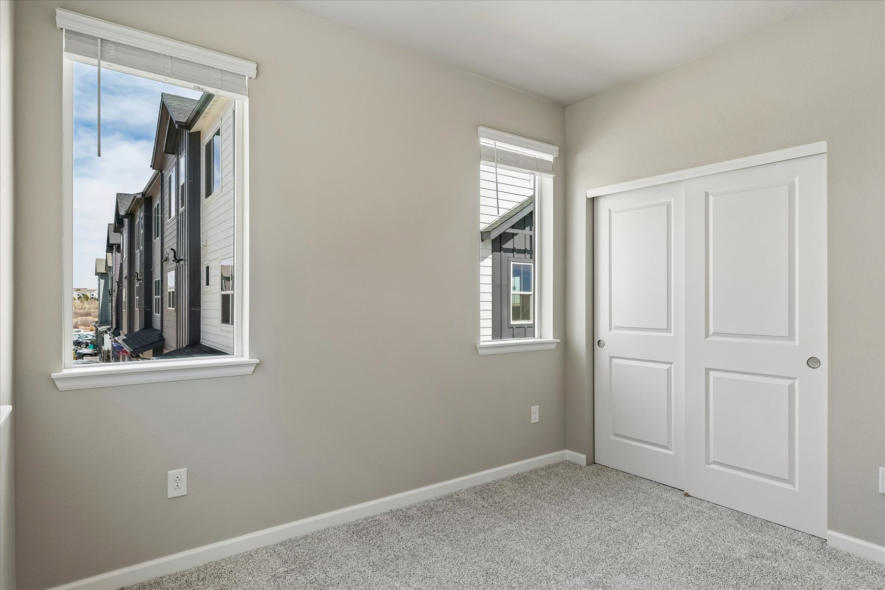 A room with white doors.