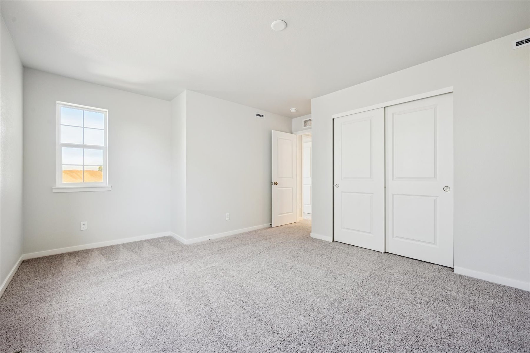 A room with white doors.