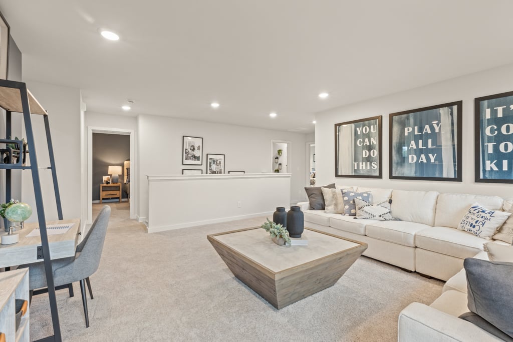 A living room with a couch and a coffee table.