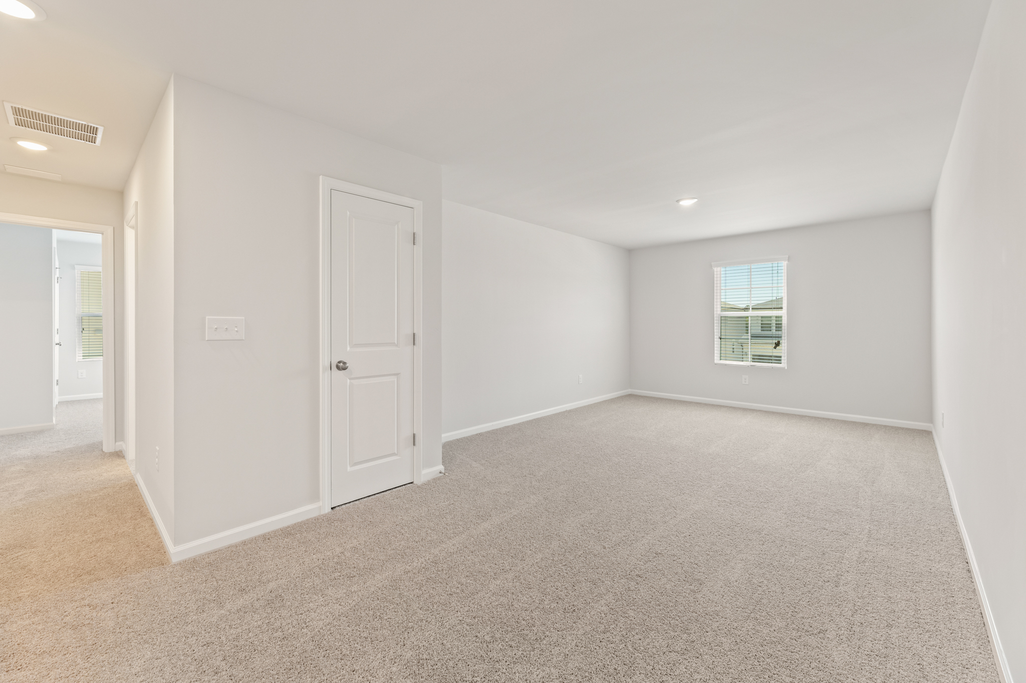 A room with white doors.