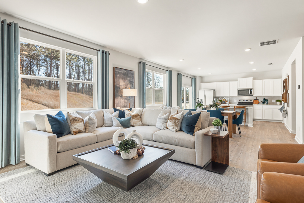 A living room with a large window.