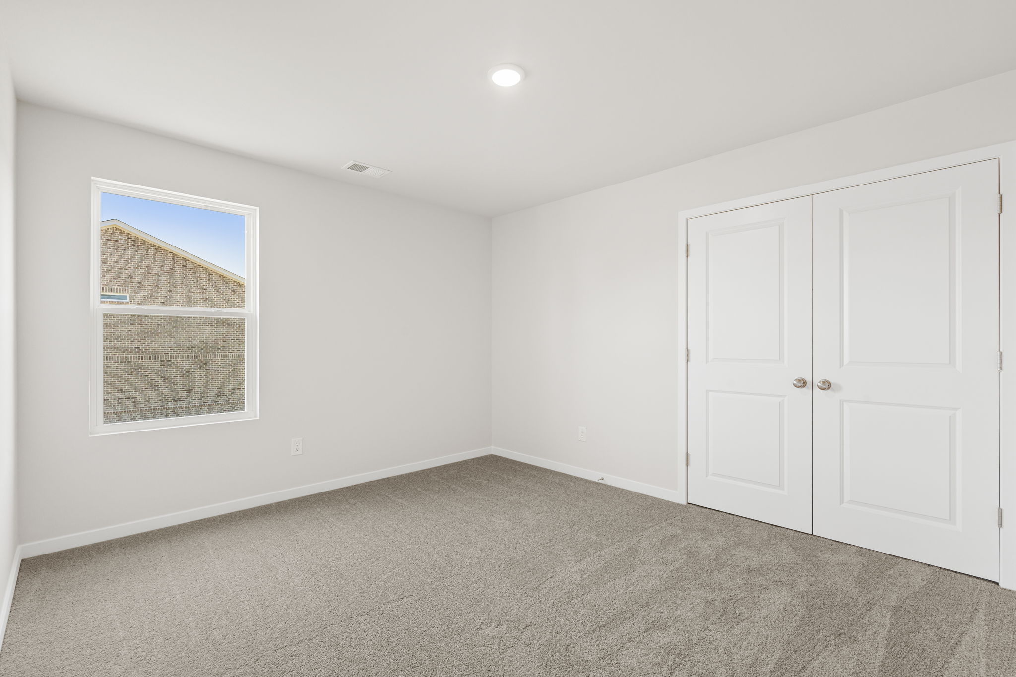 A room with white doors.
