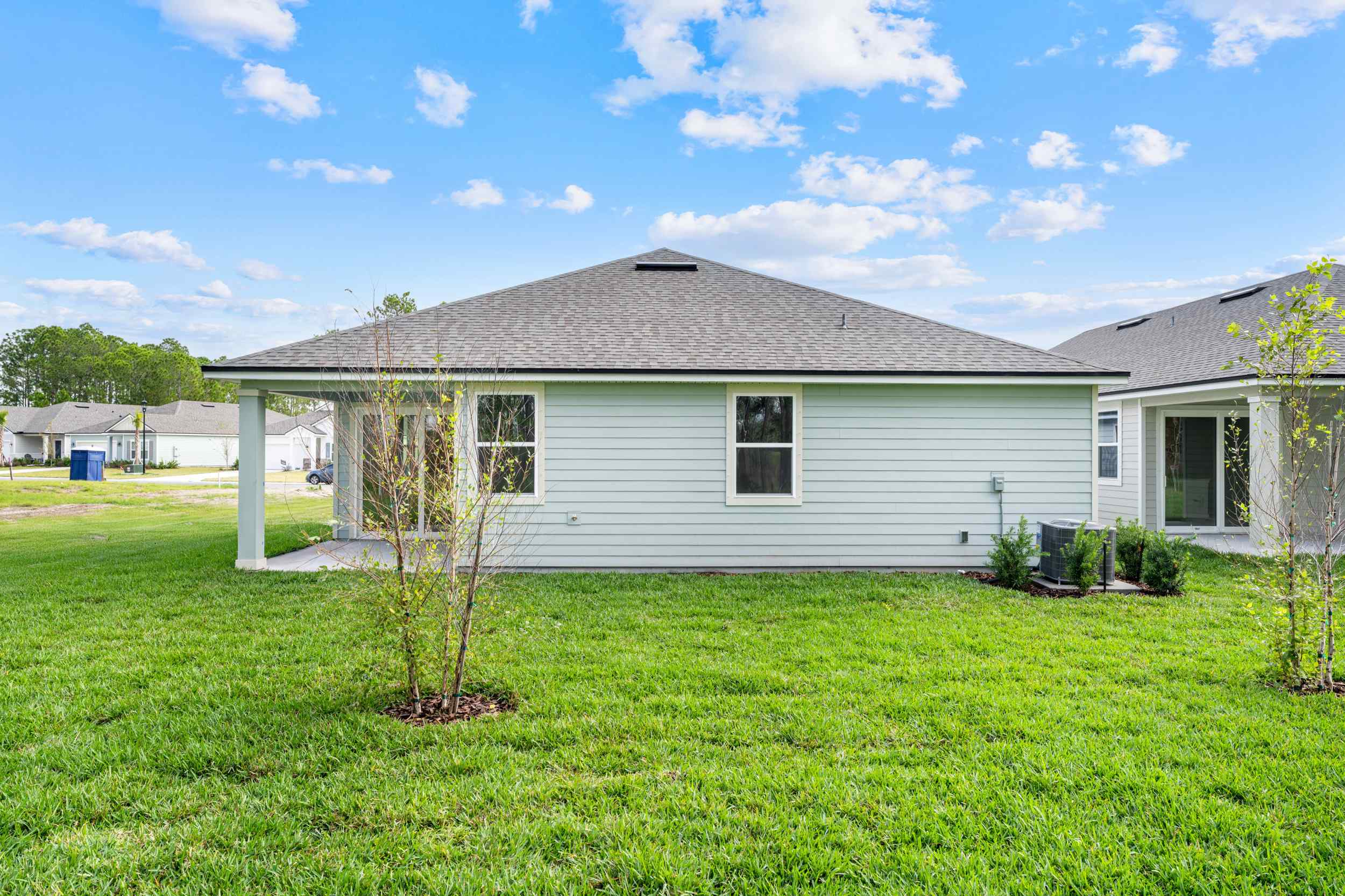 Lot 27 Rear Exterior with Covered Patio at Reserve East in Flagler Beach
