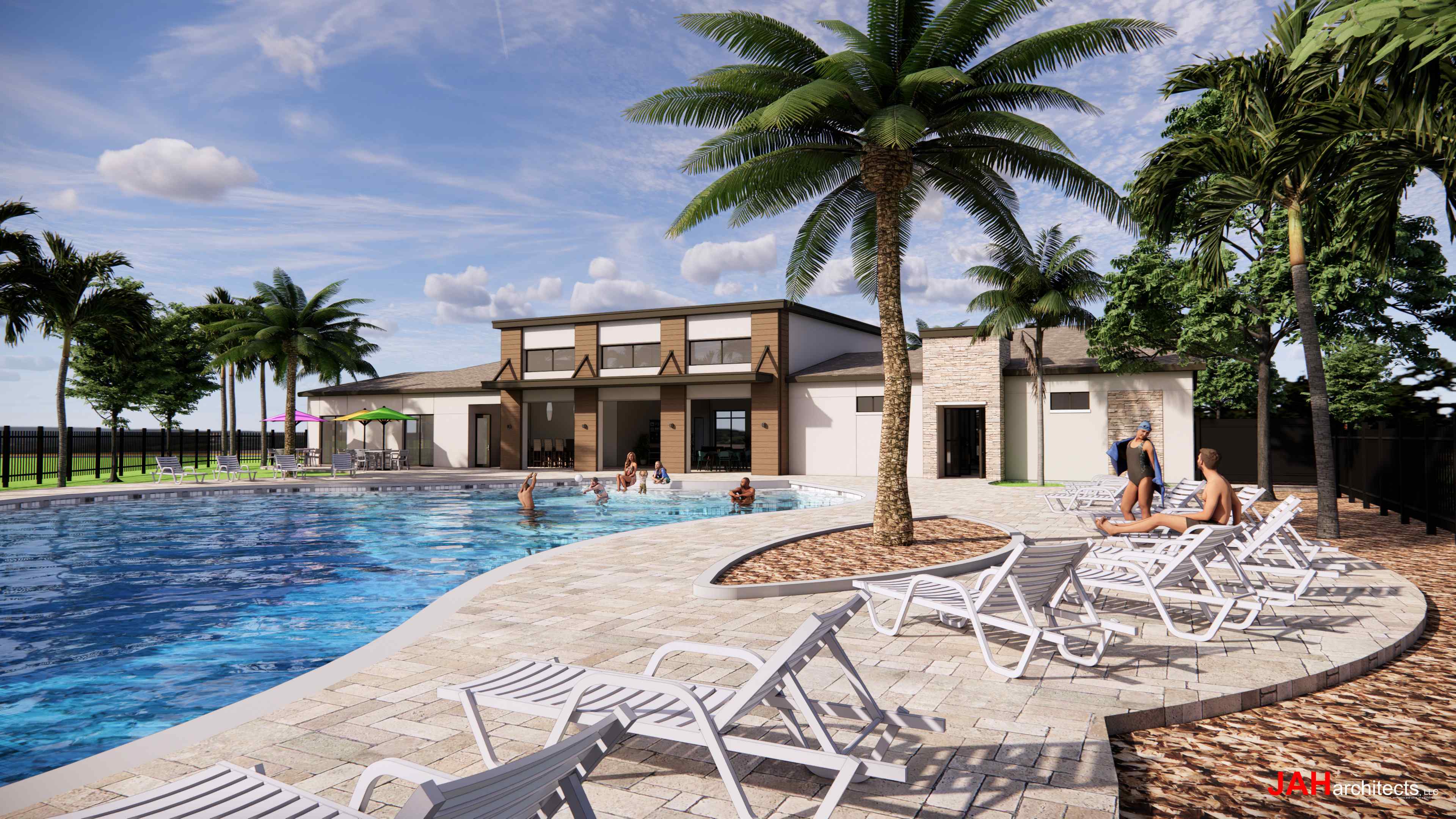 A pool with lounge chairs and palm trees next to it.