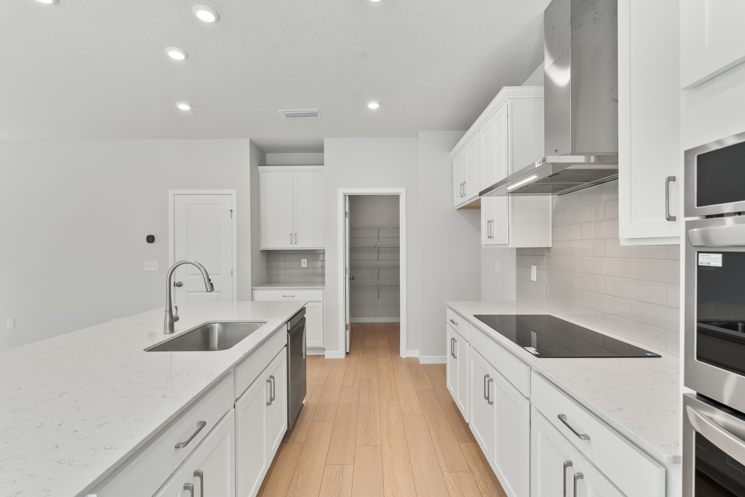 Lot 67 Chef's Kitchen with Walk In Pantry at Seminole Palms