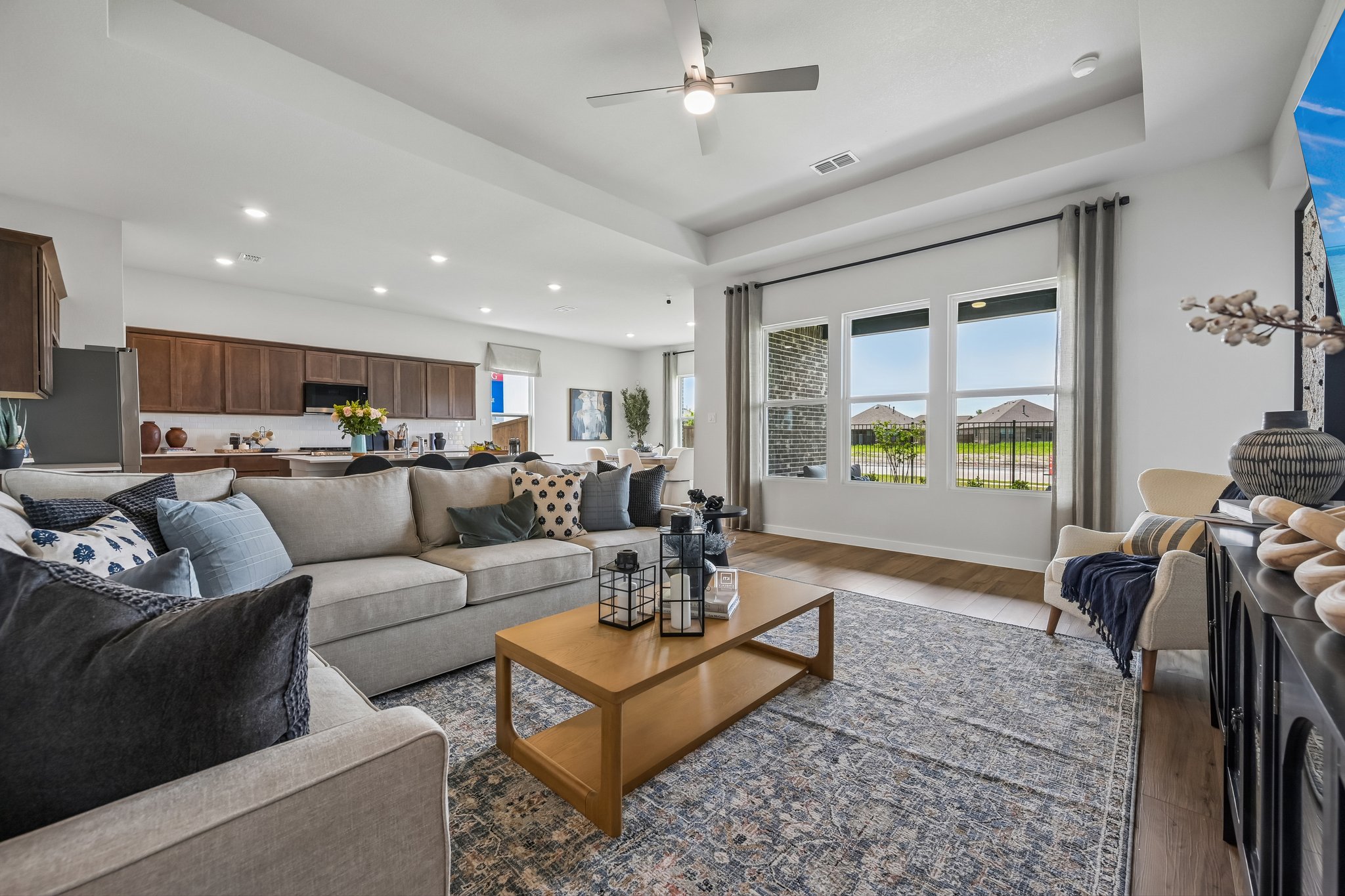 A living room with a large window.