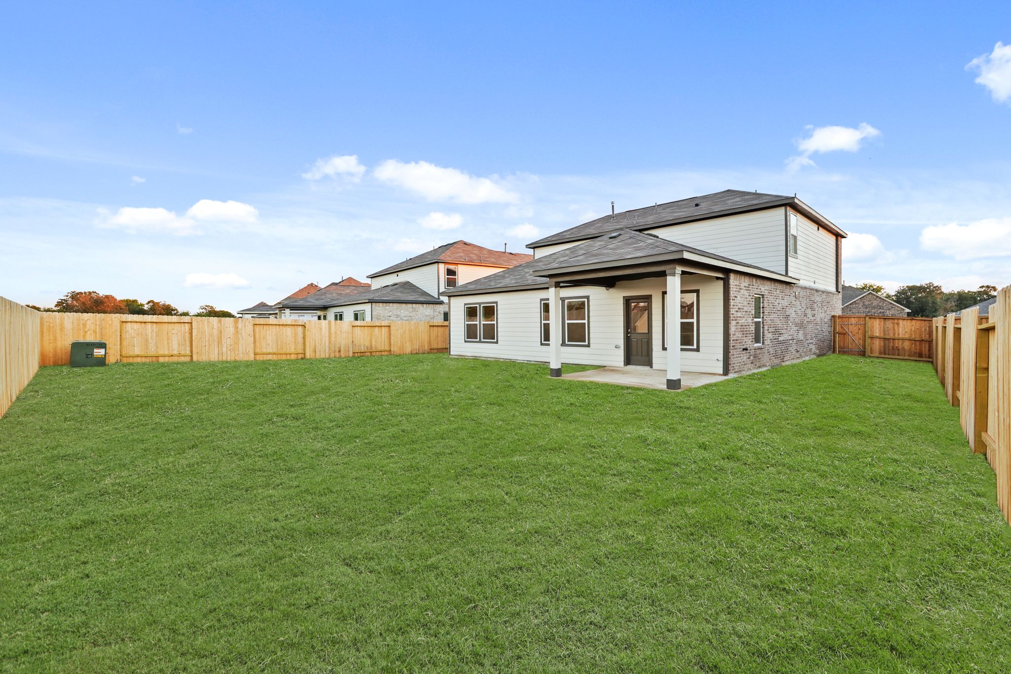 A house with a fence around it.