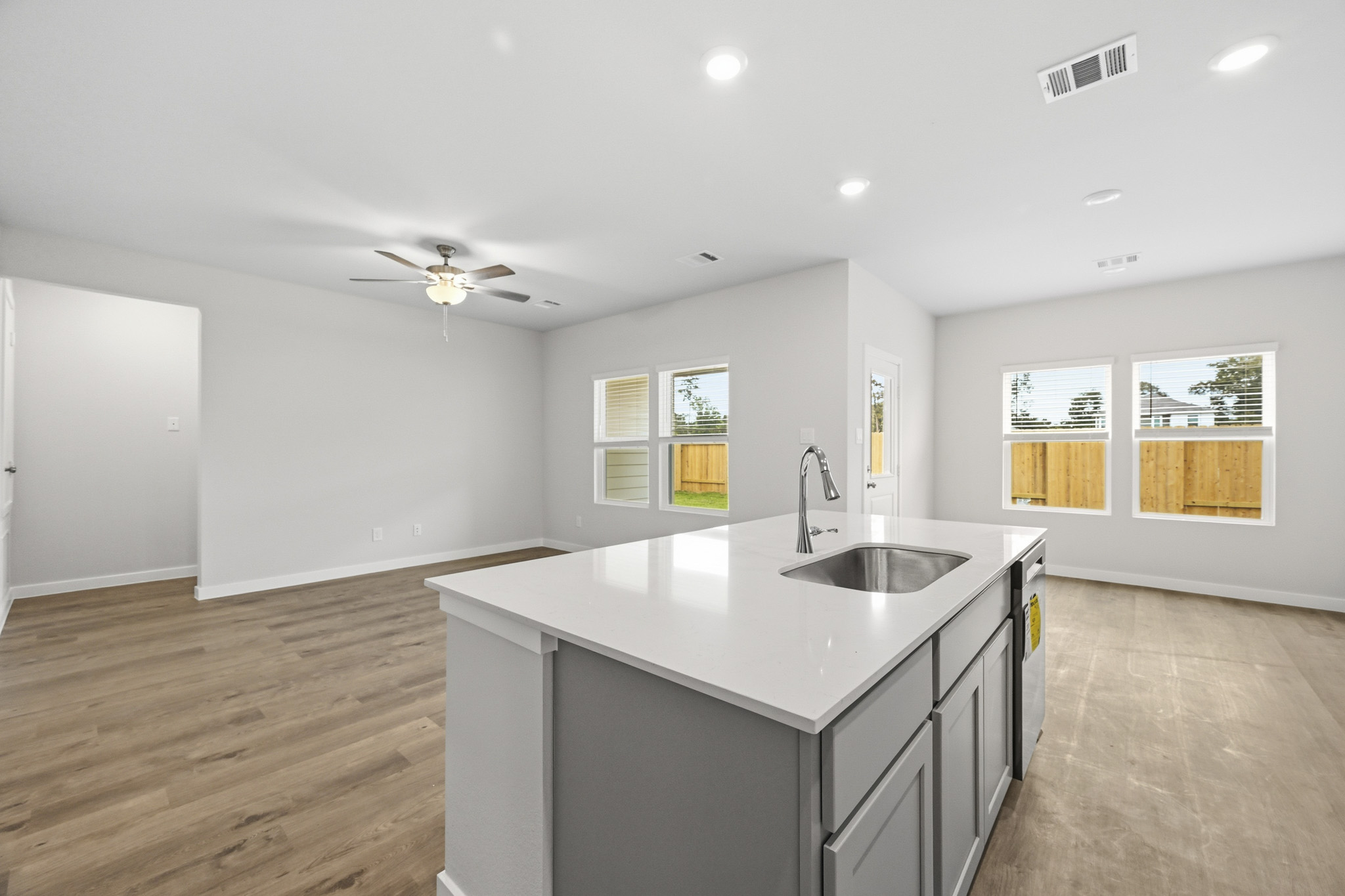 A kitchen with a sink and a countertop.
