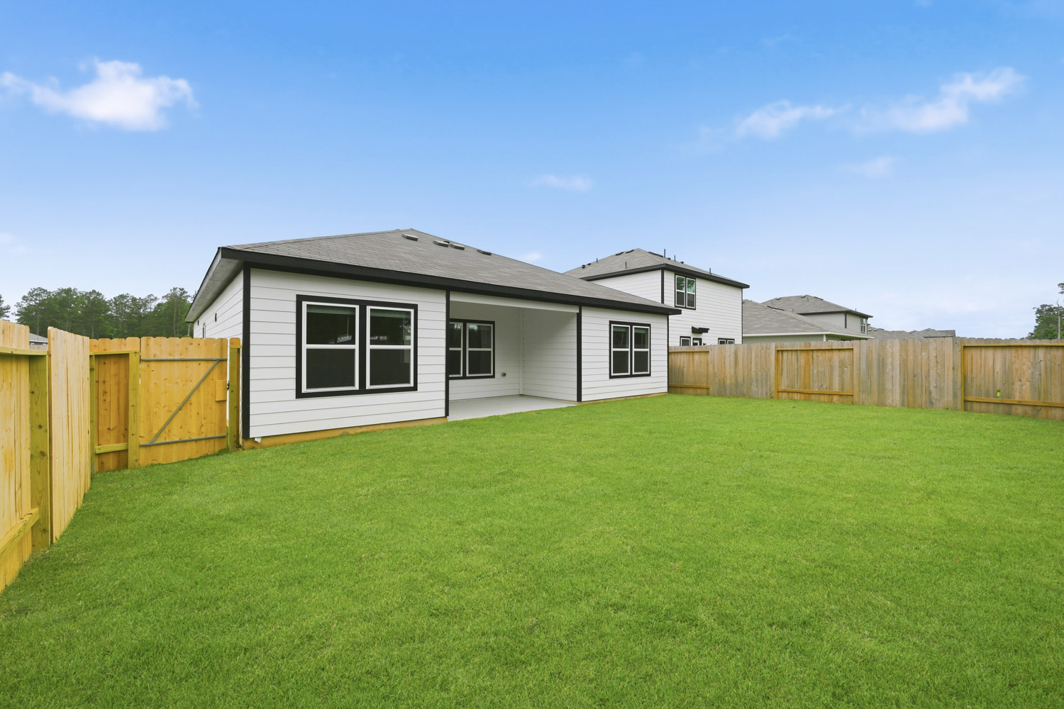 A house with a fence around it.