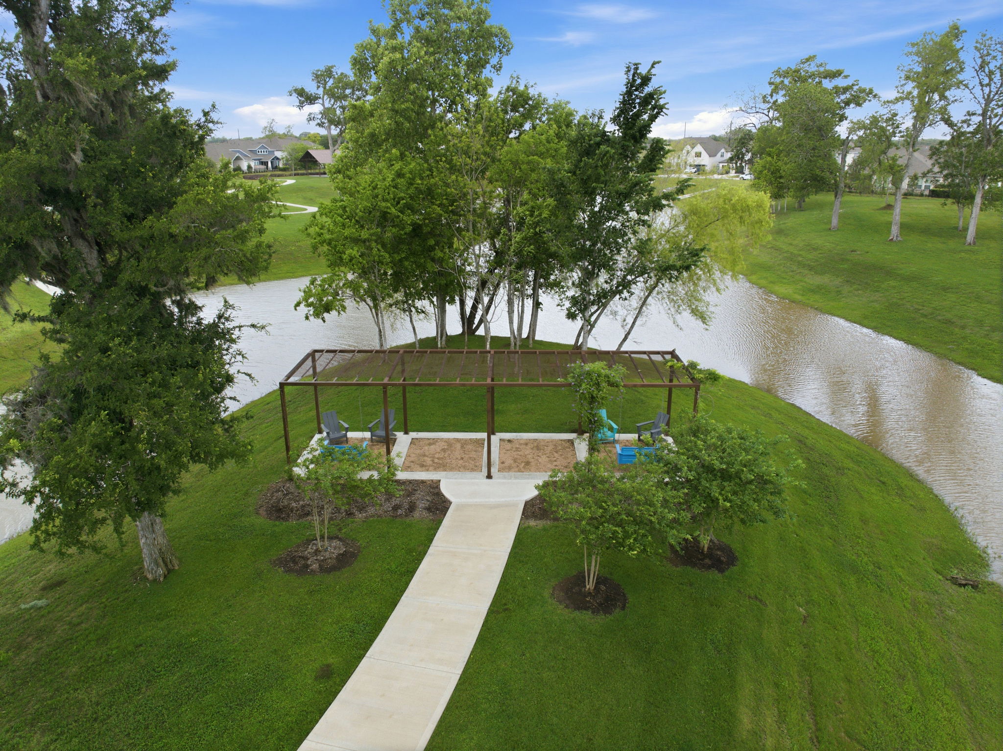 A small pond with a small bridge.