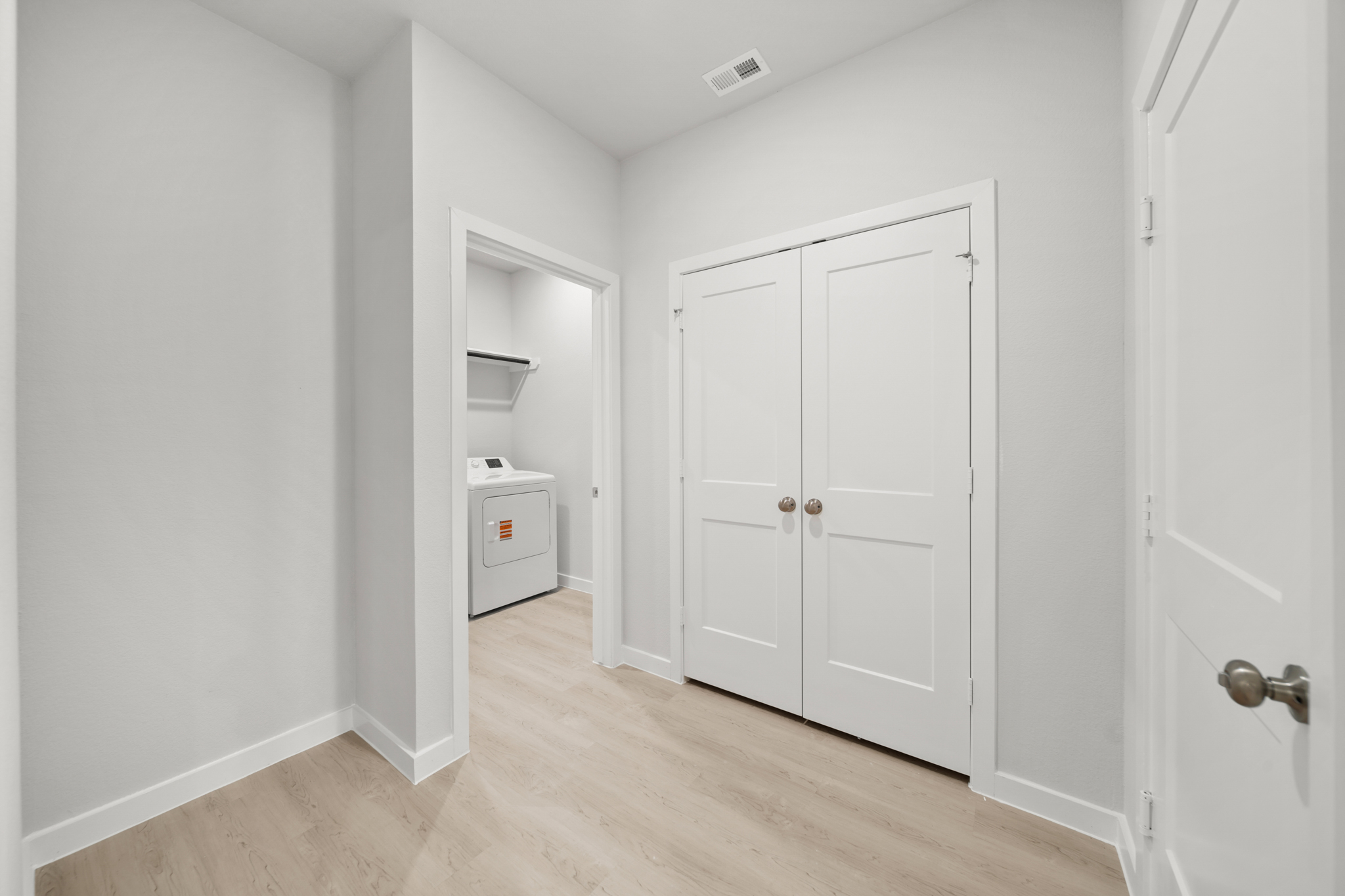 A room with white doors.