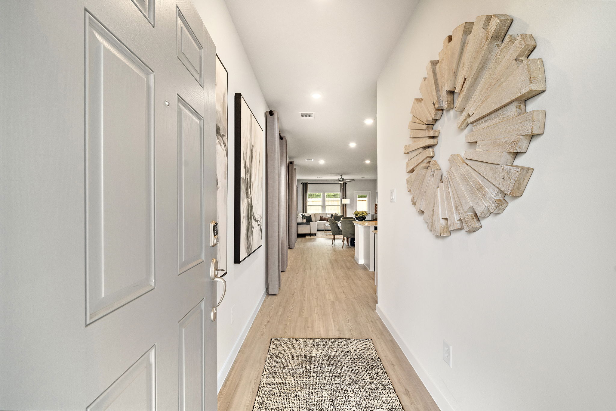 A hallway with white doors.