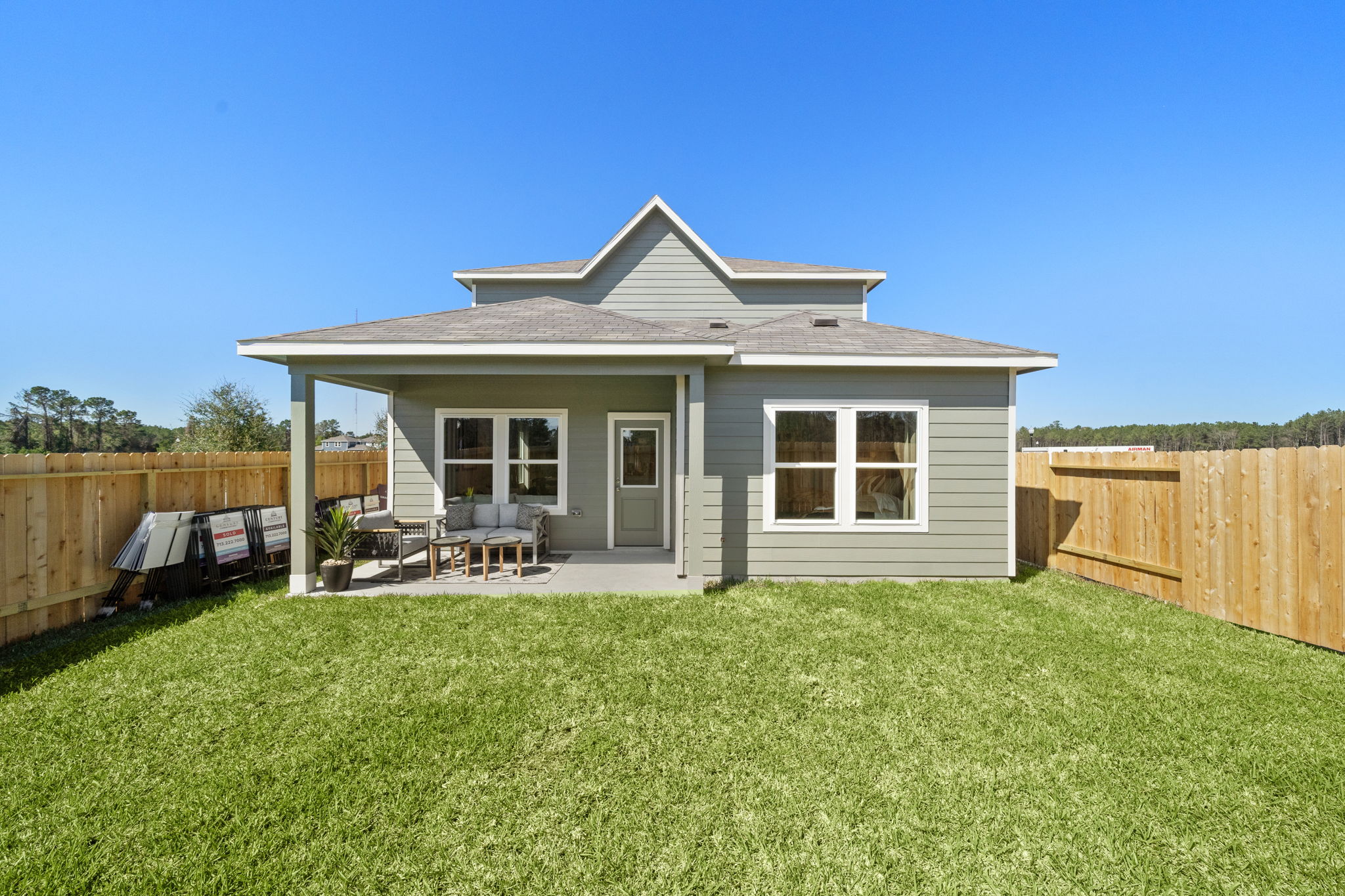 A house with a fence around it.