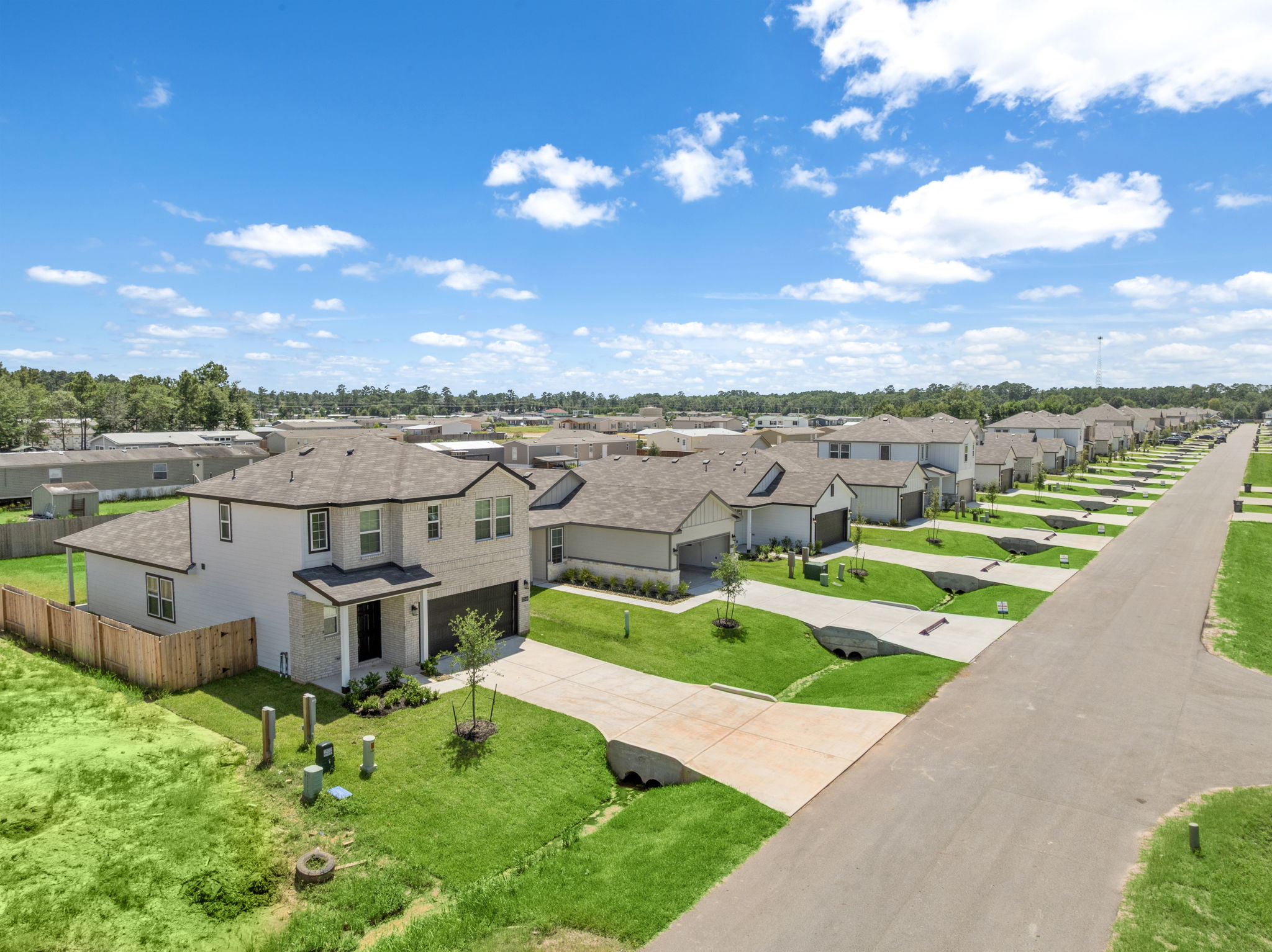A large house with a driveway.