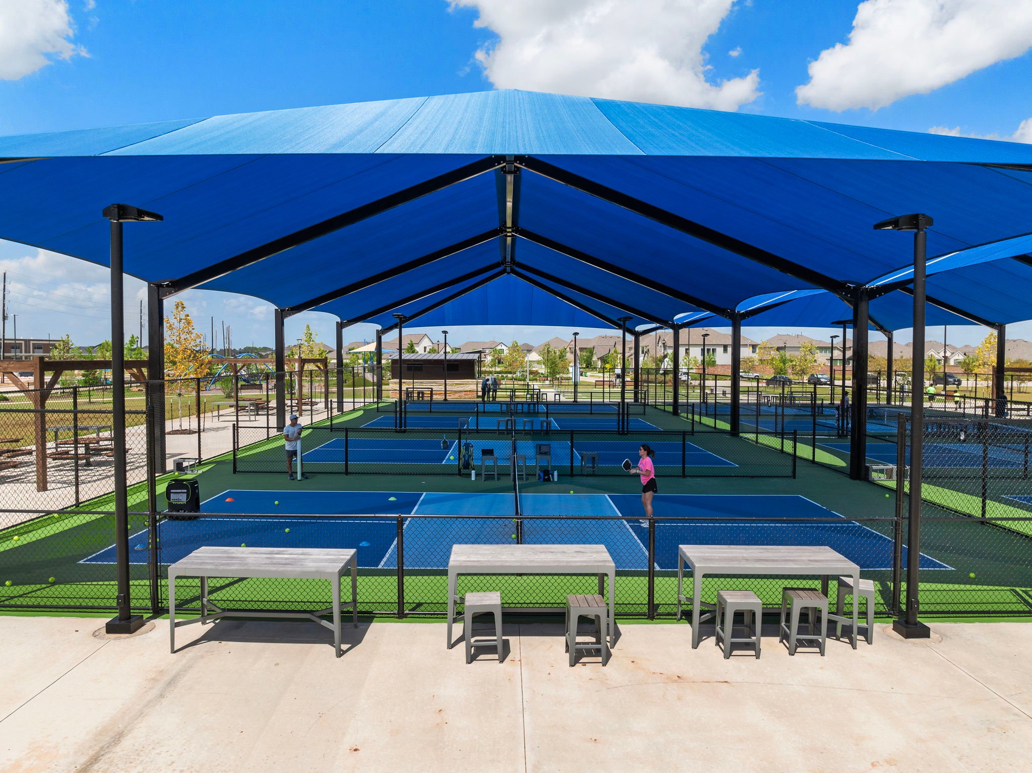 A swimming pool with a covered area.