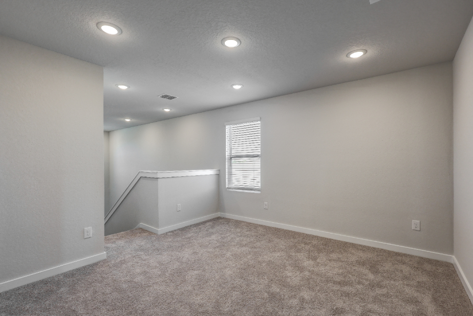 A room with a door and a window.