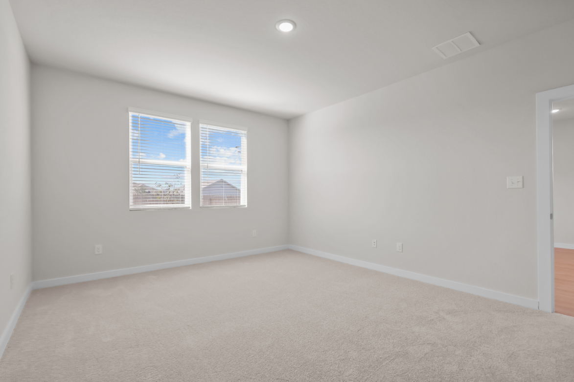 A room with a few windows.