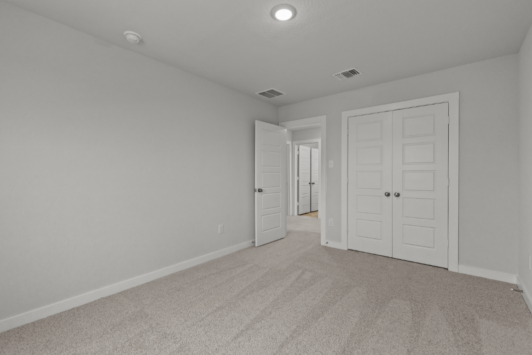 A room with white doors.