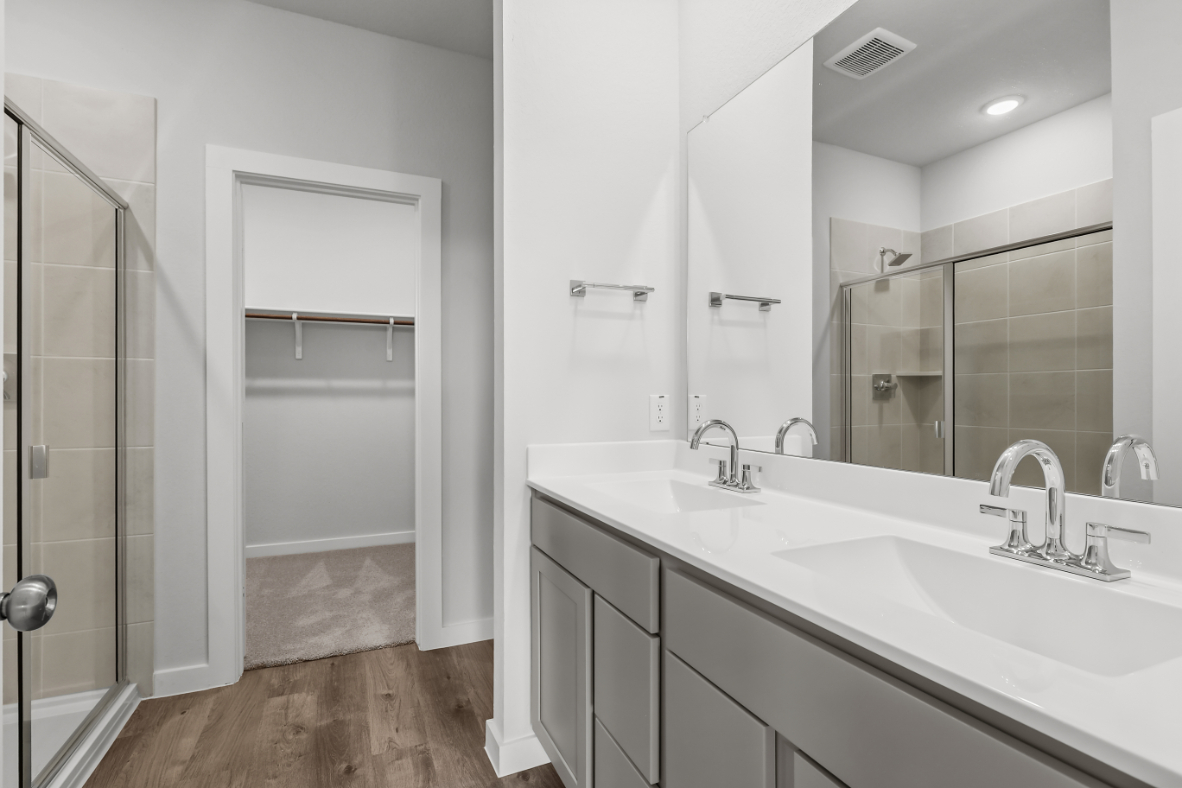 A bathroom with a glass shower.