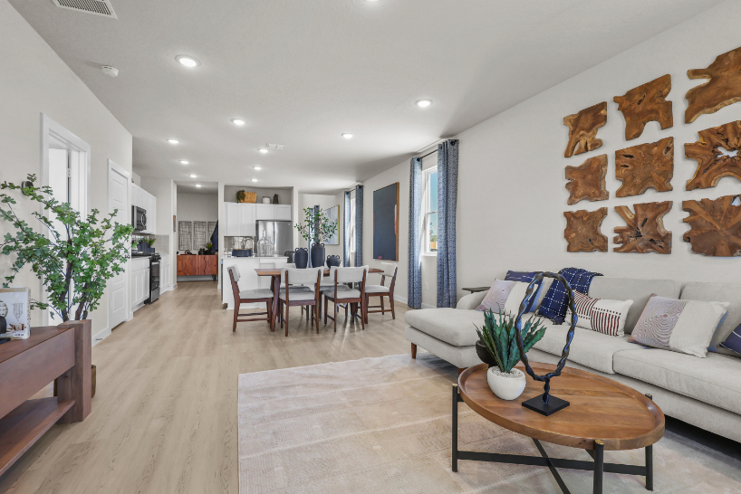 A room with a table and chairs.