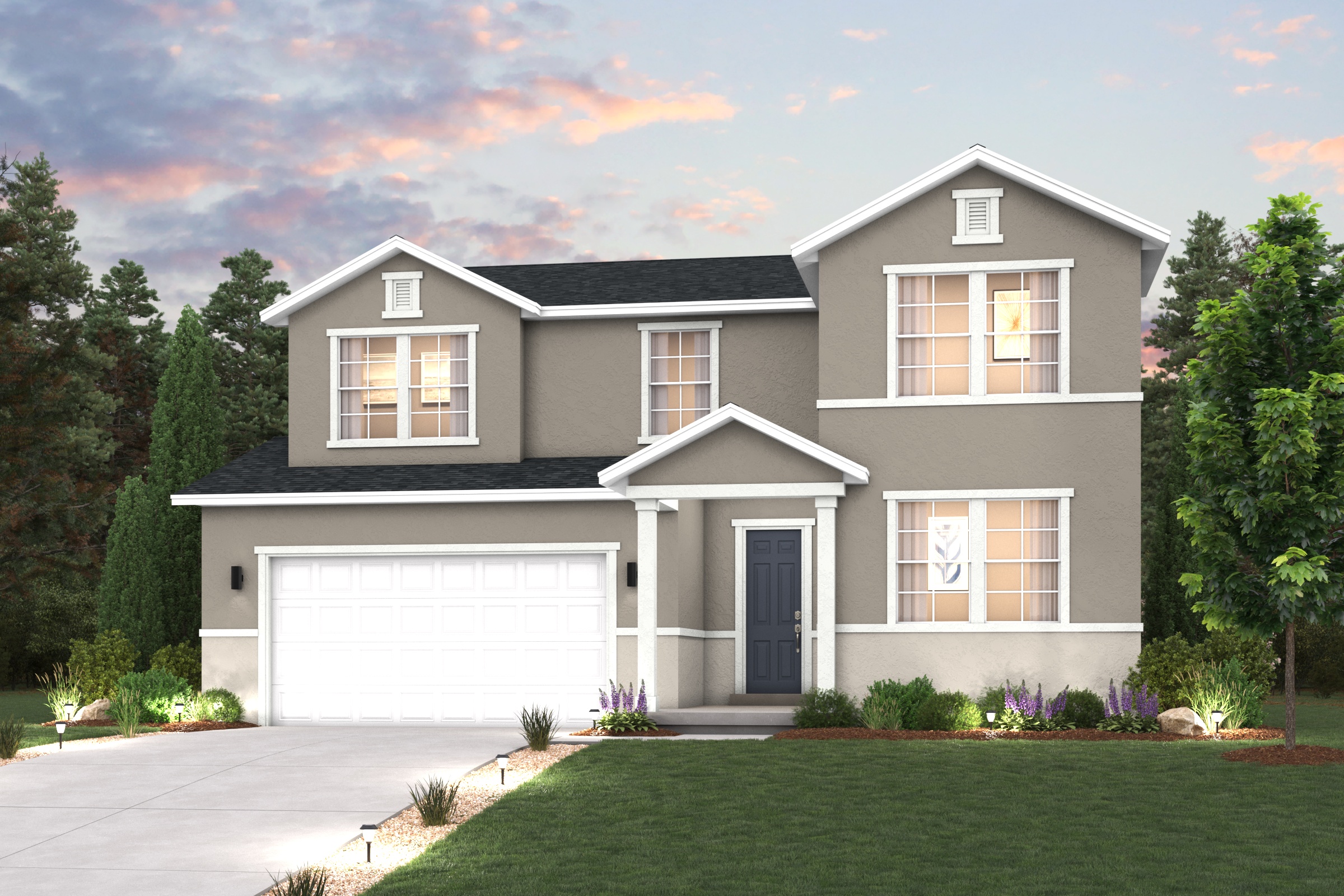 A house with a garage and trees around it.