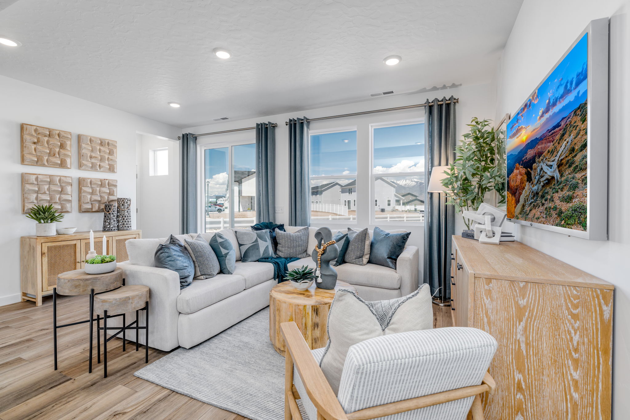 A living room with a large window.