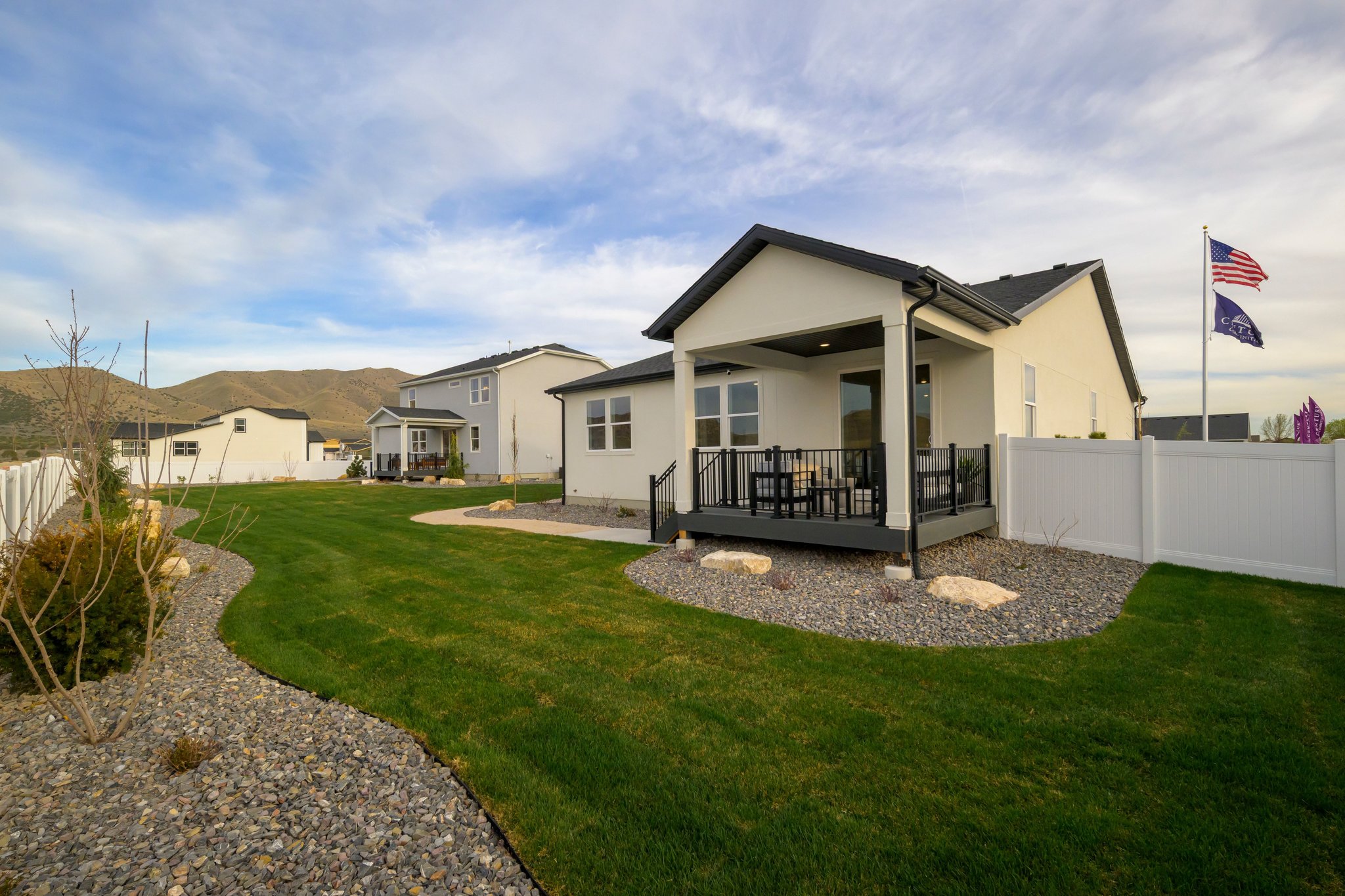 A house with a flag on the roof.