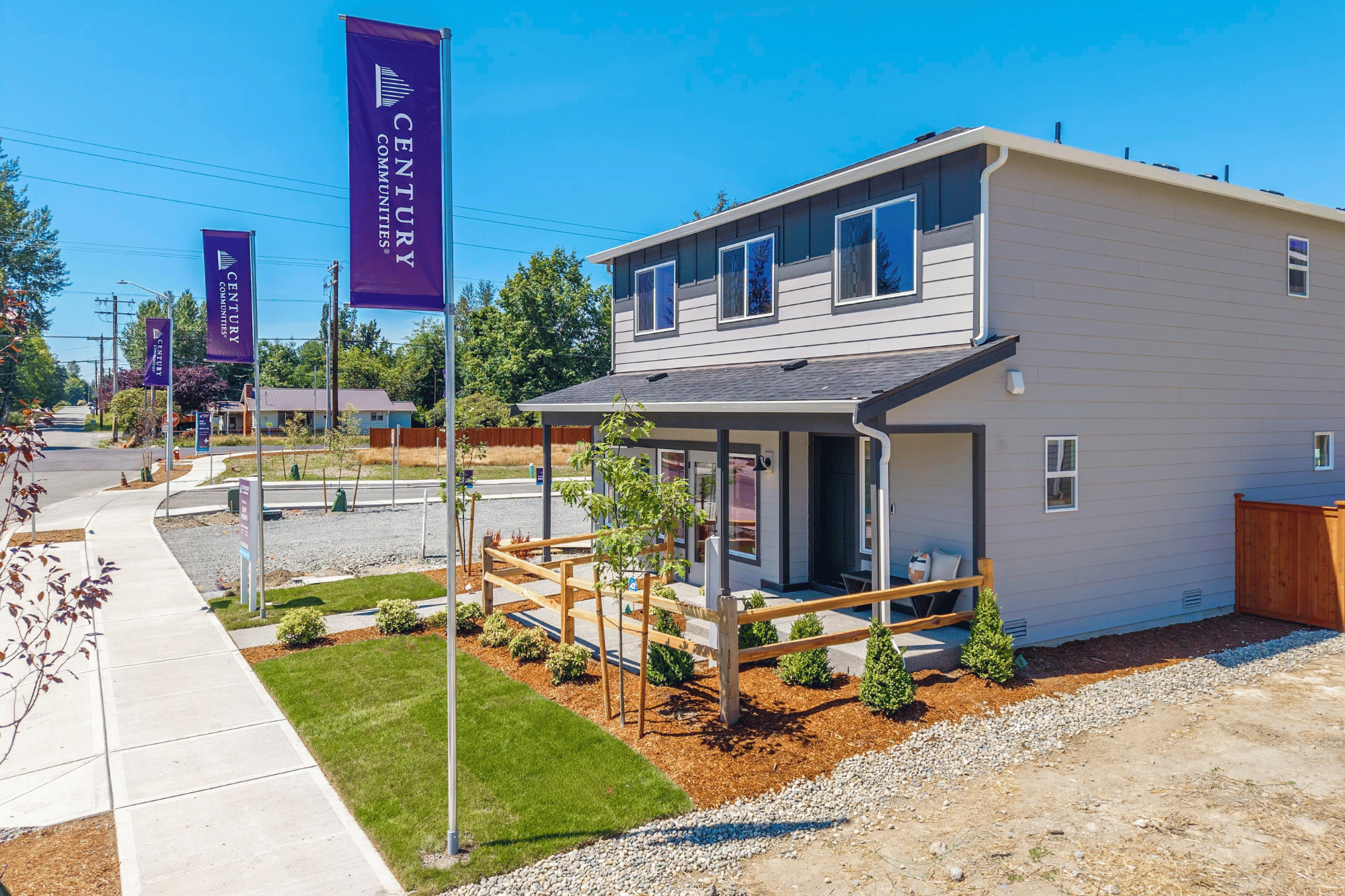A house with a sign in front.