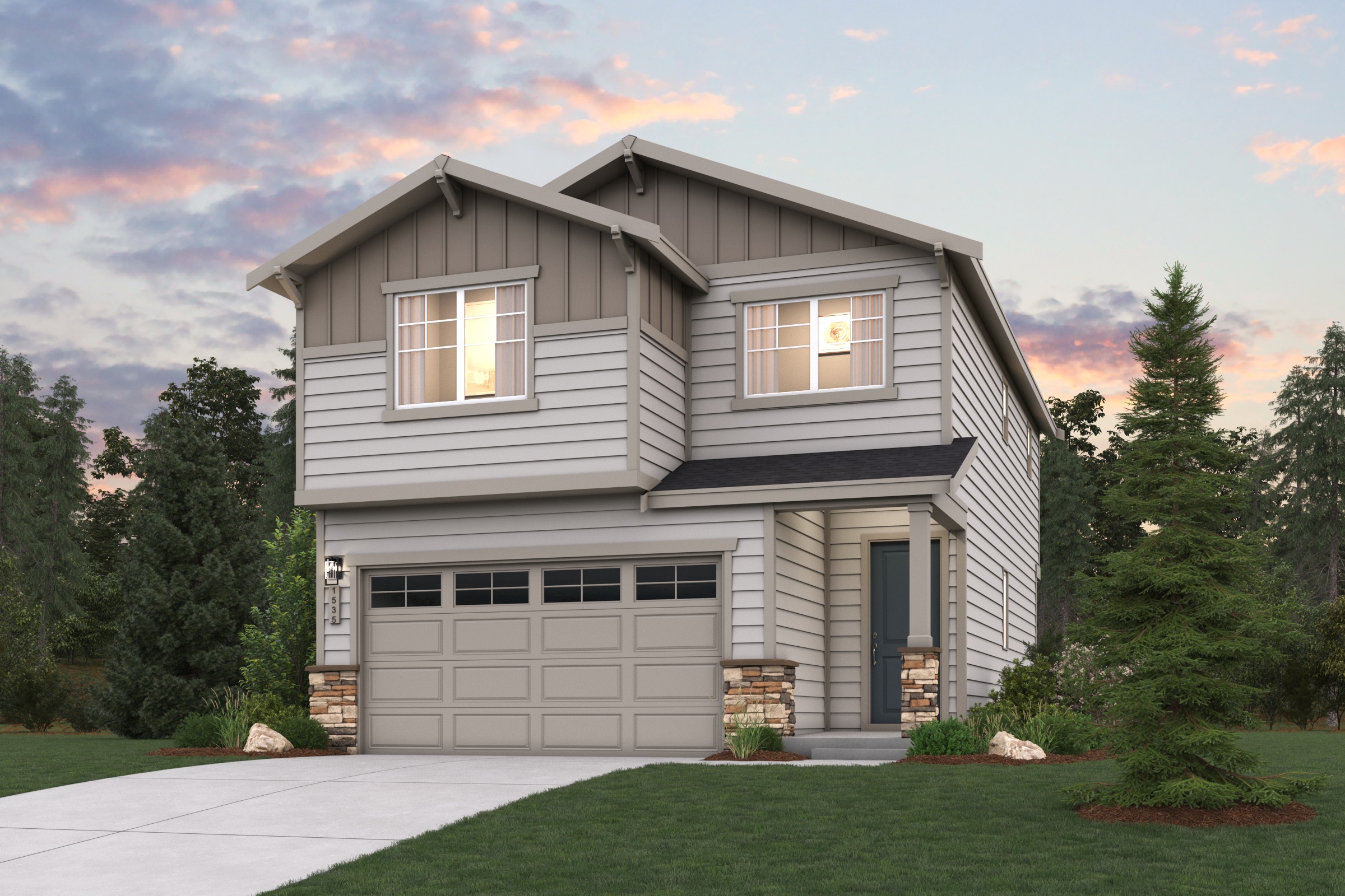 A house with a garage and trees around it.